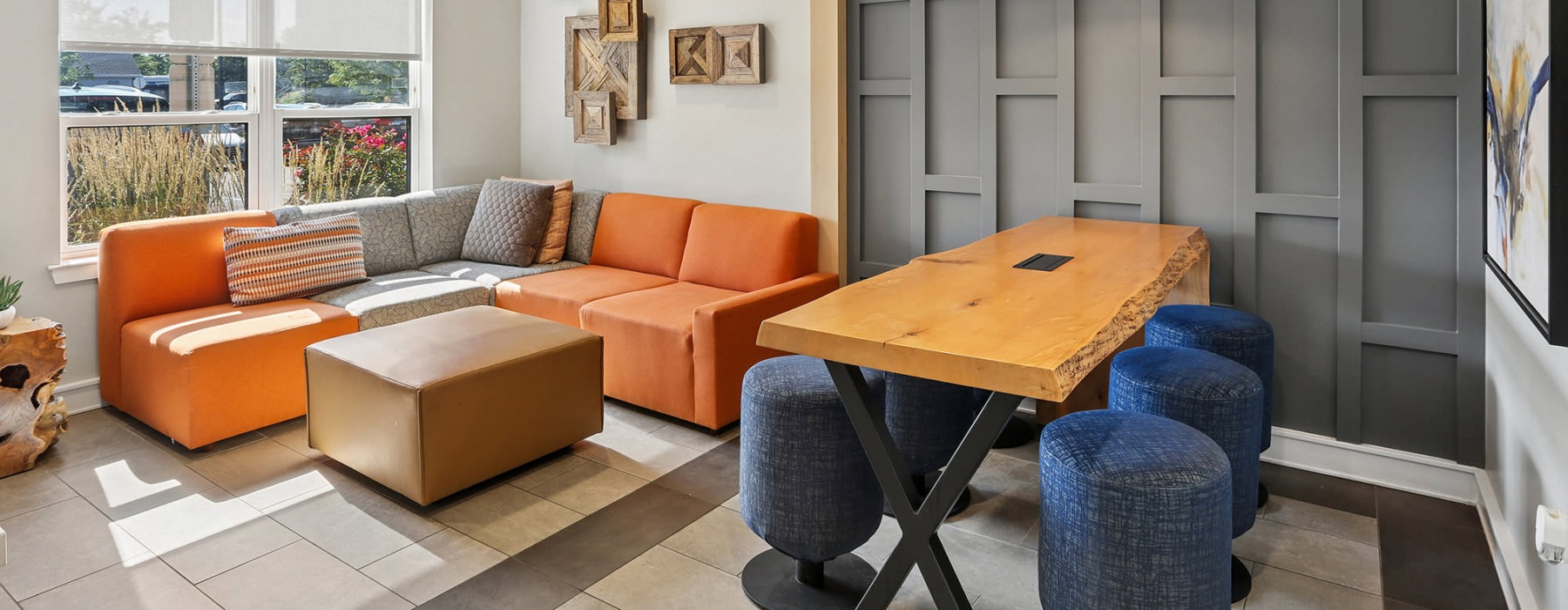 sunny clubroom with tables and chairs